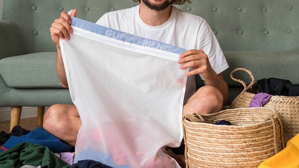 How often should I clean the lint from the bag